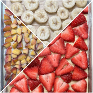 bananas, strawberries, and peaches on freeze dryer trays