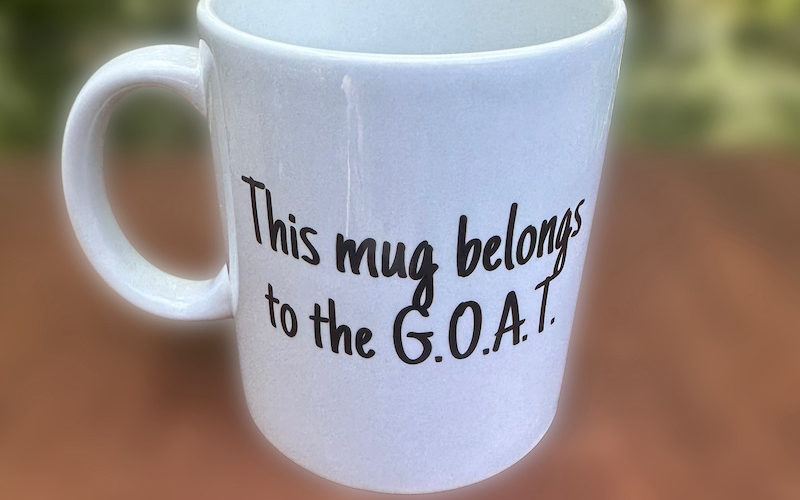 mug belongs to G.O.A.T. - side 1